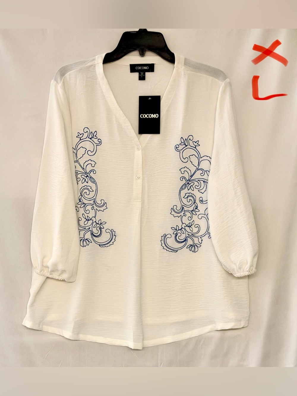 Cocomo White V-Neck Blouse with Blue Scroll Motif